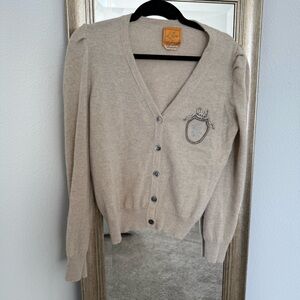 Elegant Beige Cardigan with Embellished Crest
